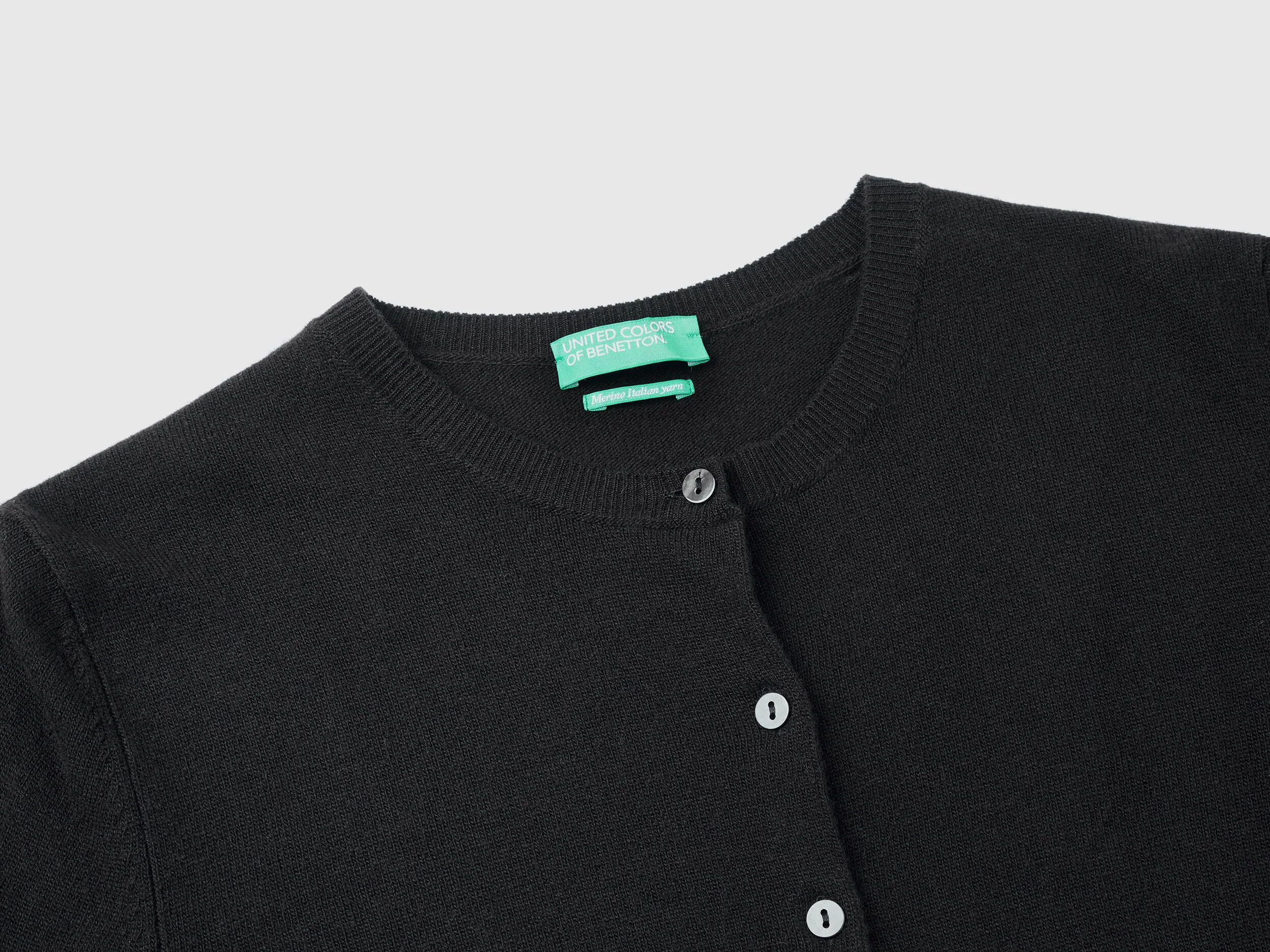 Cárdigan de cuello redondo negro de pura lana Merina
