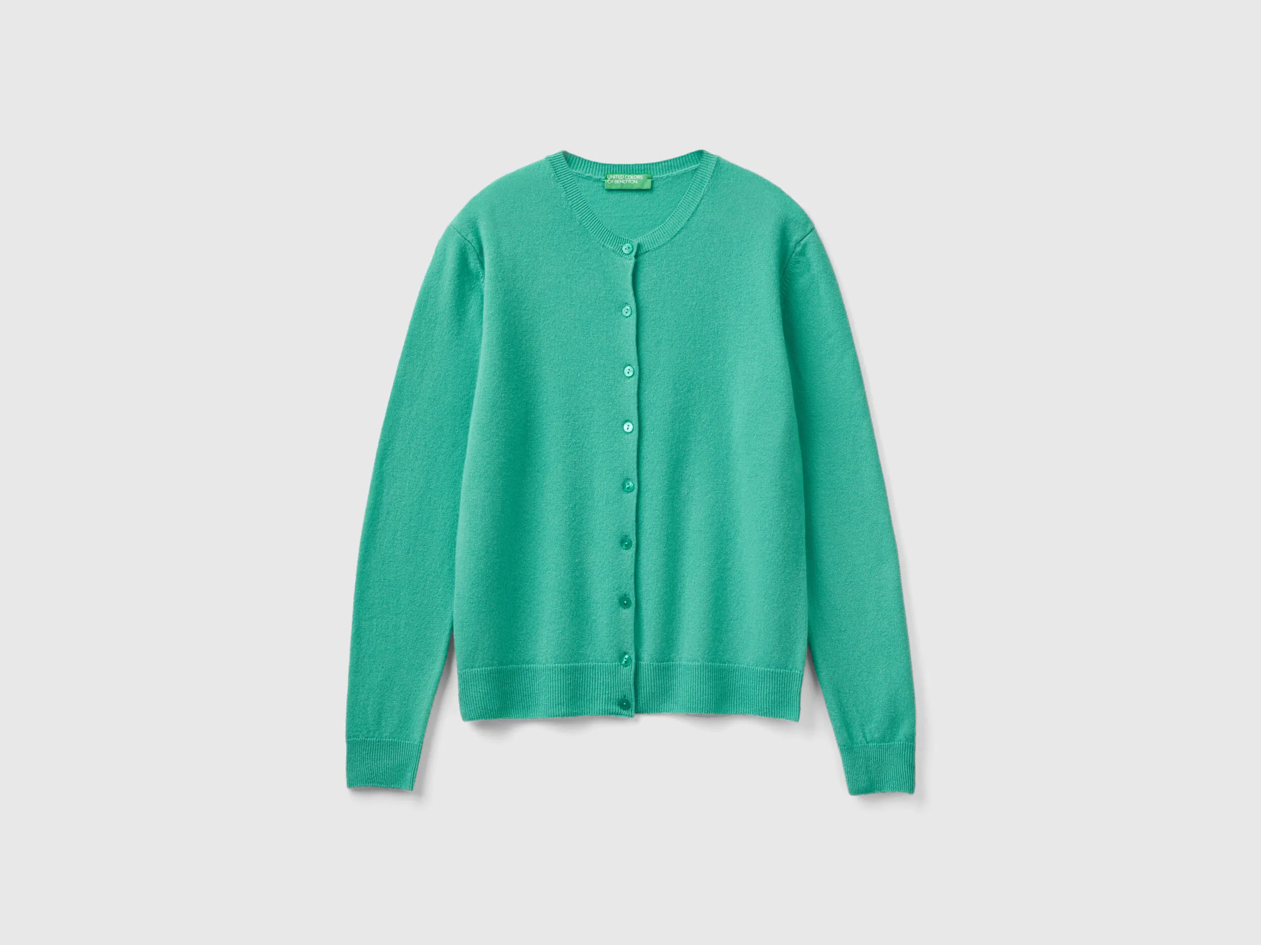 Cárdigan de cuello redondo verde claro de pura lana merina
