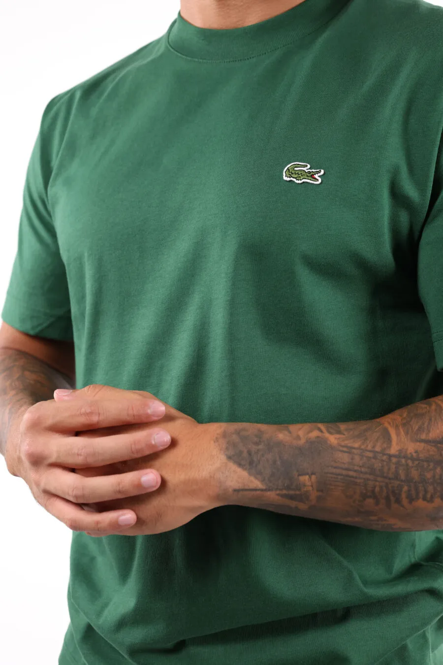 Camiseta verde oscuro con minilogo 