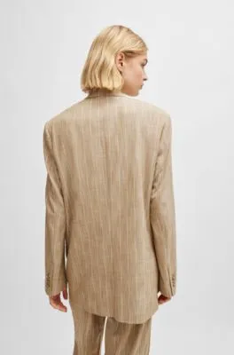 Chaqueta cruzada en tejido elástico con raya diplomática
