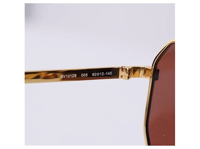 Gafas de sol Bottega Veneta BV1012S en metal dorado 