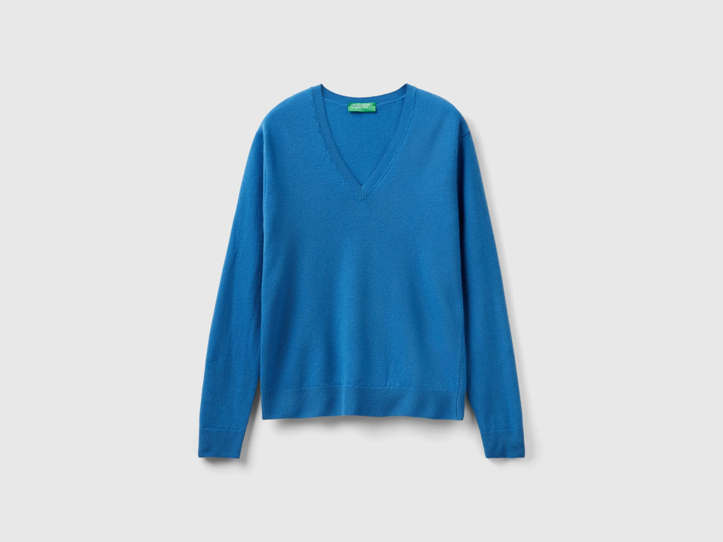 Jersey con escote de pico azul oscuro de pura lana merina