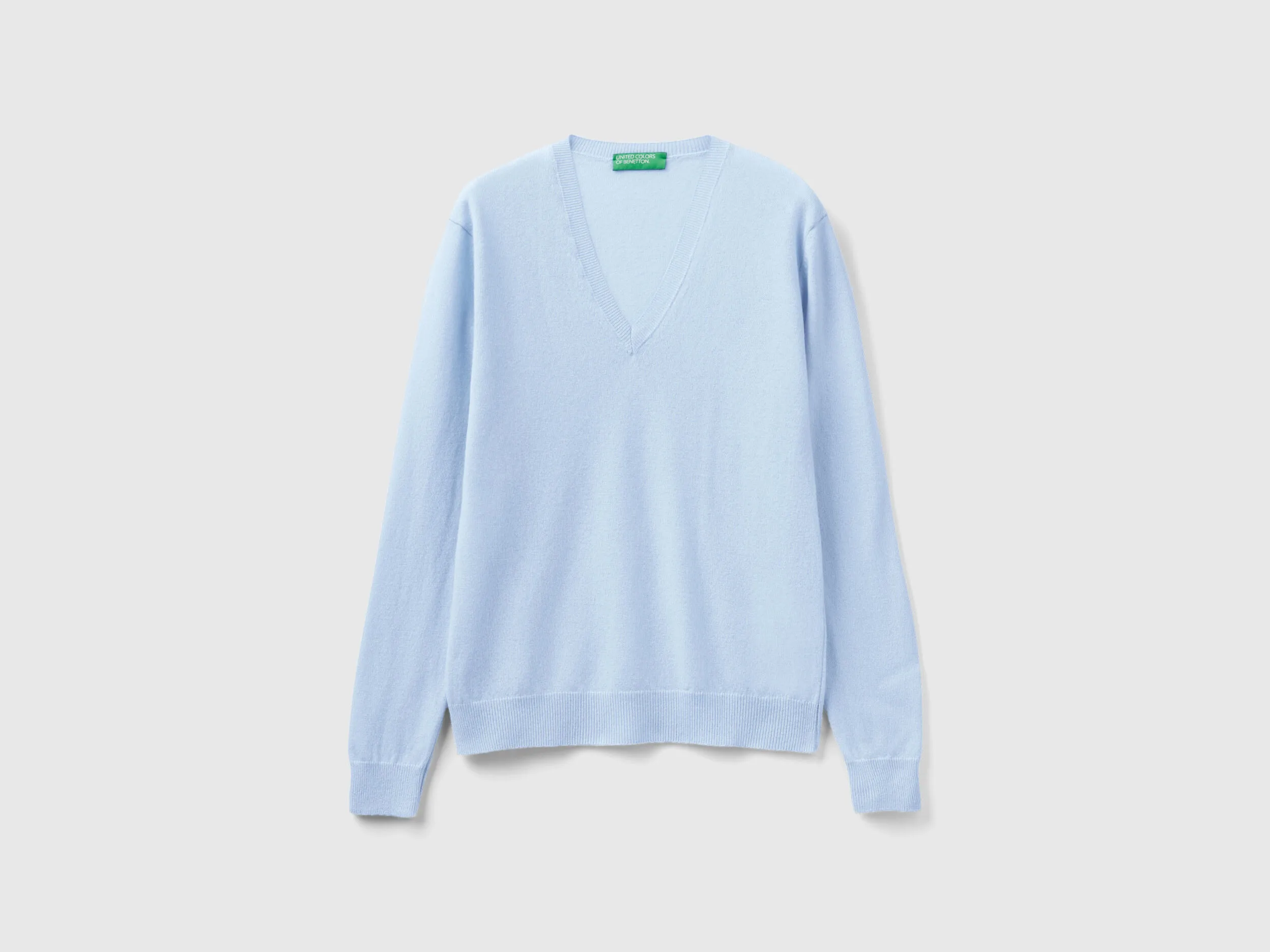 Jersey con escote de pico celeste de pura lana merina