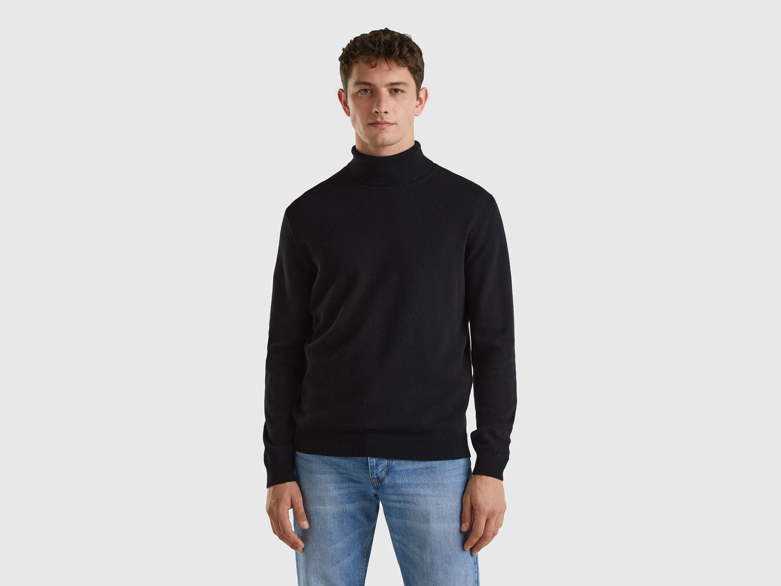 Jersey de cuello cisne negro de pura lana Merina