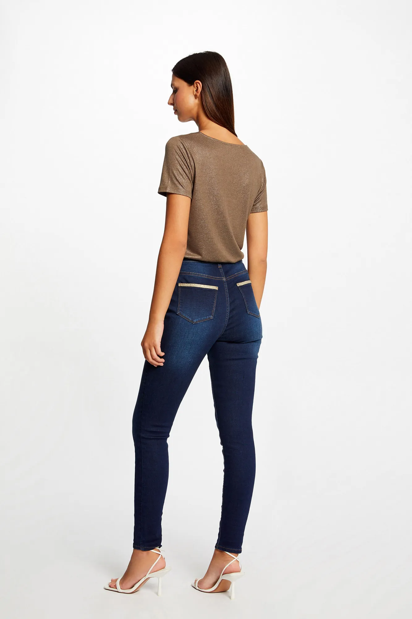Morgan Vaquero skinny con bandas metalizadas