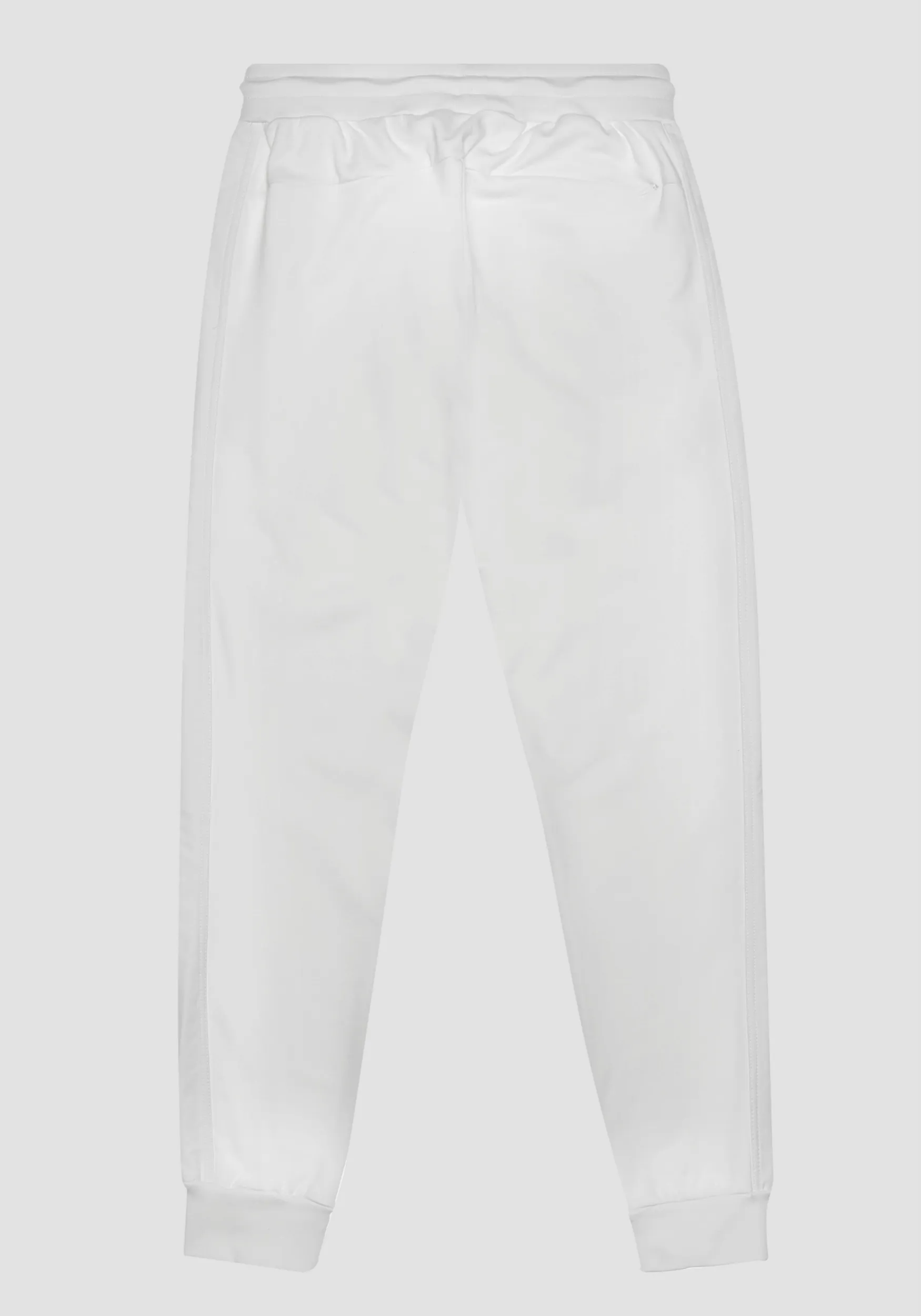 PANTALONES DE CHÁNDAL DE CORTE AJUSTADO CON LOGOTIPO BORDADO