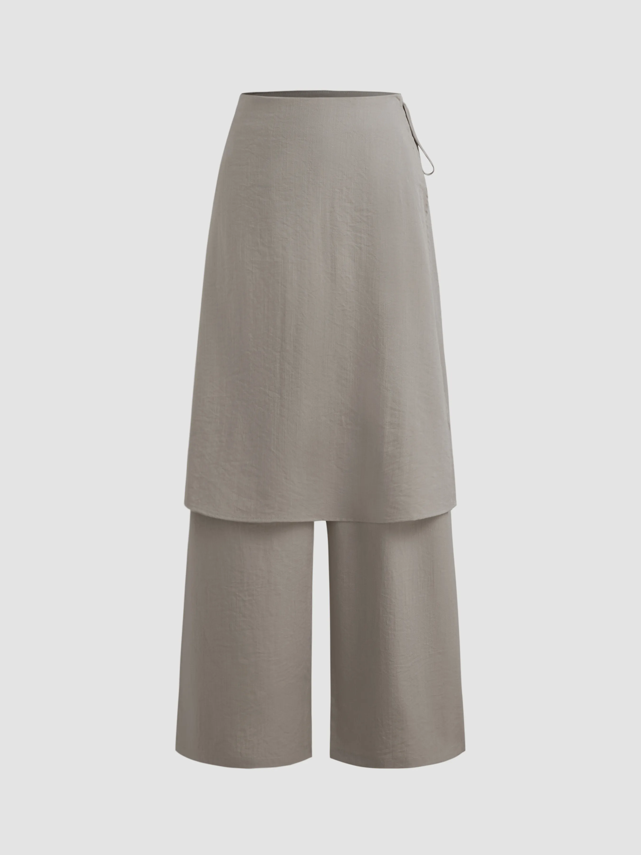 Pantalón ancho tejido de talle medio con nudo sólido