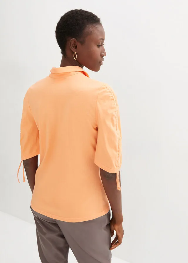 Polo con contenido de seda Naranja suave