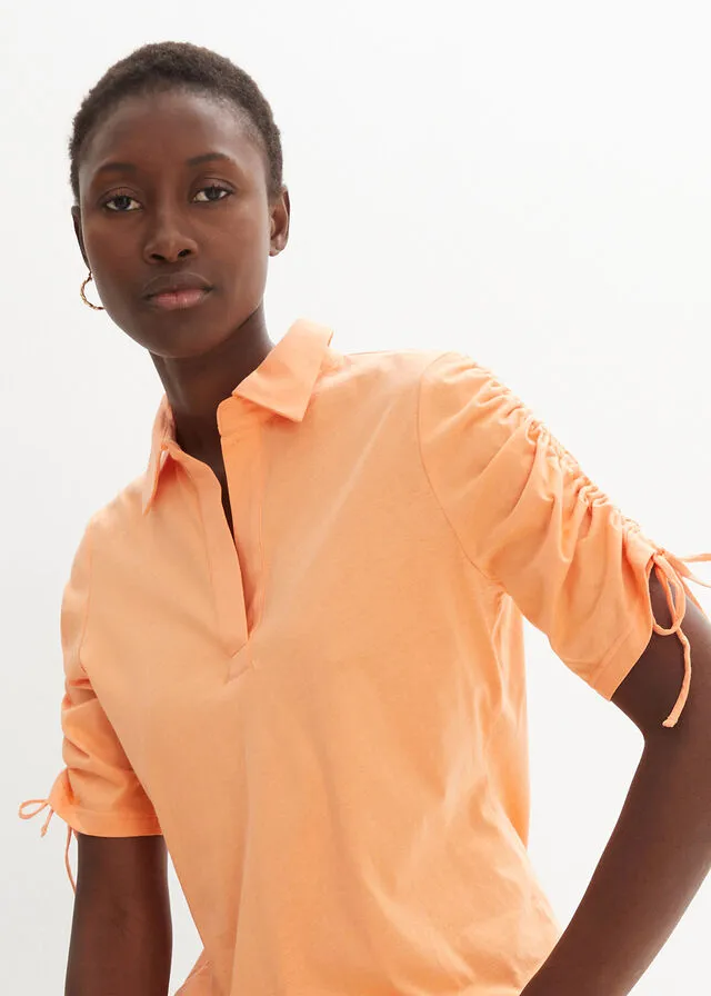 Polo con contenido de seda Naranja suave