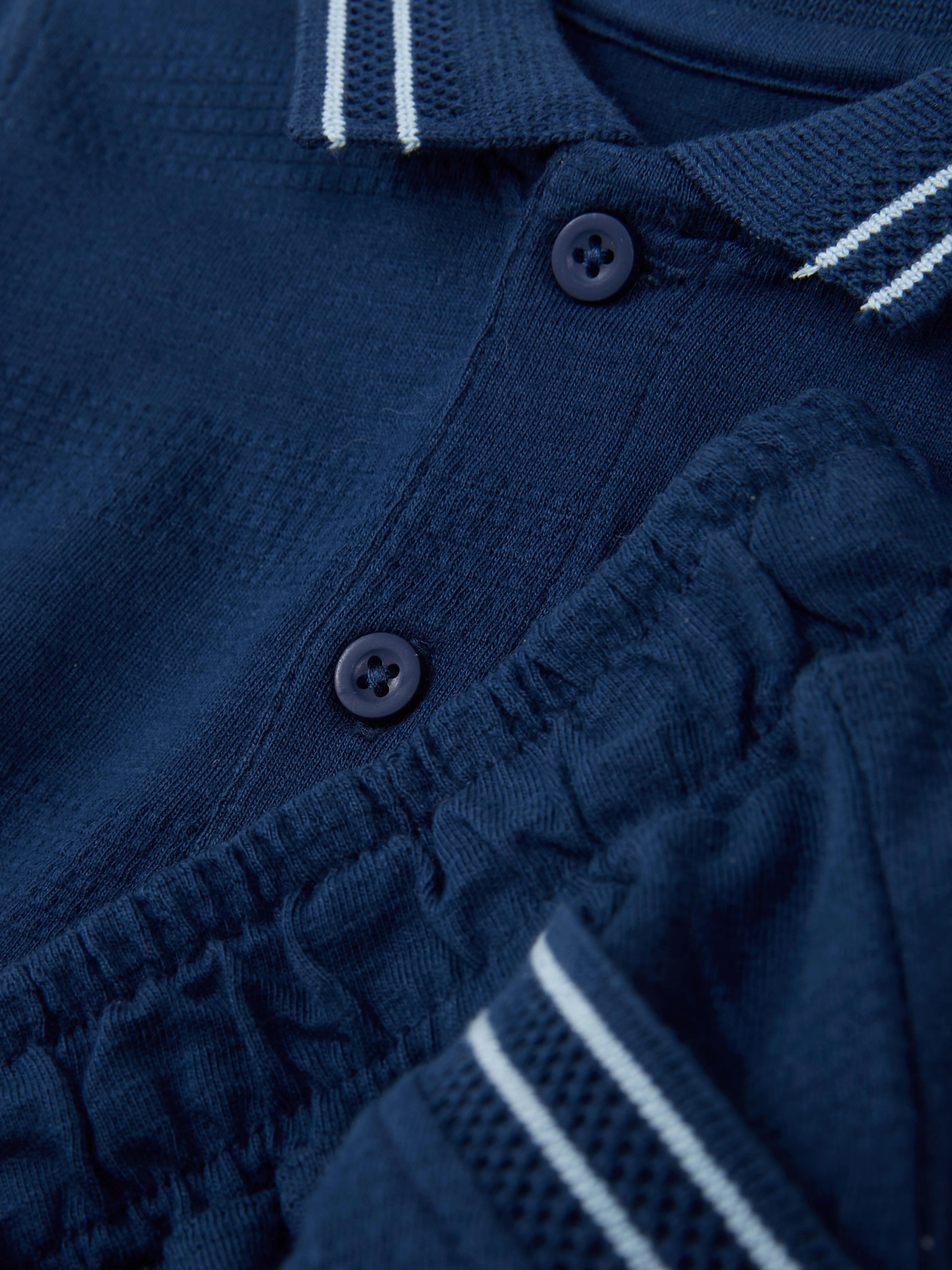 Set de polo y pantalones cortos a juego