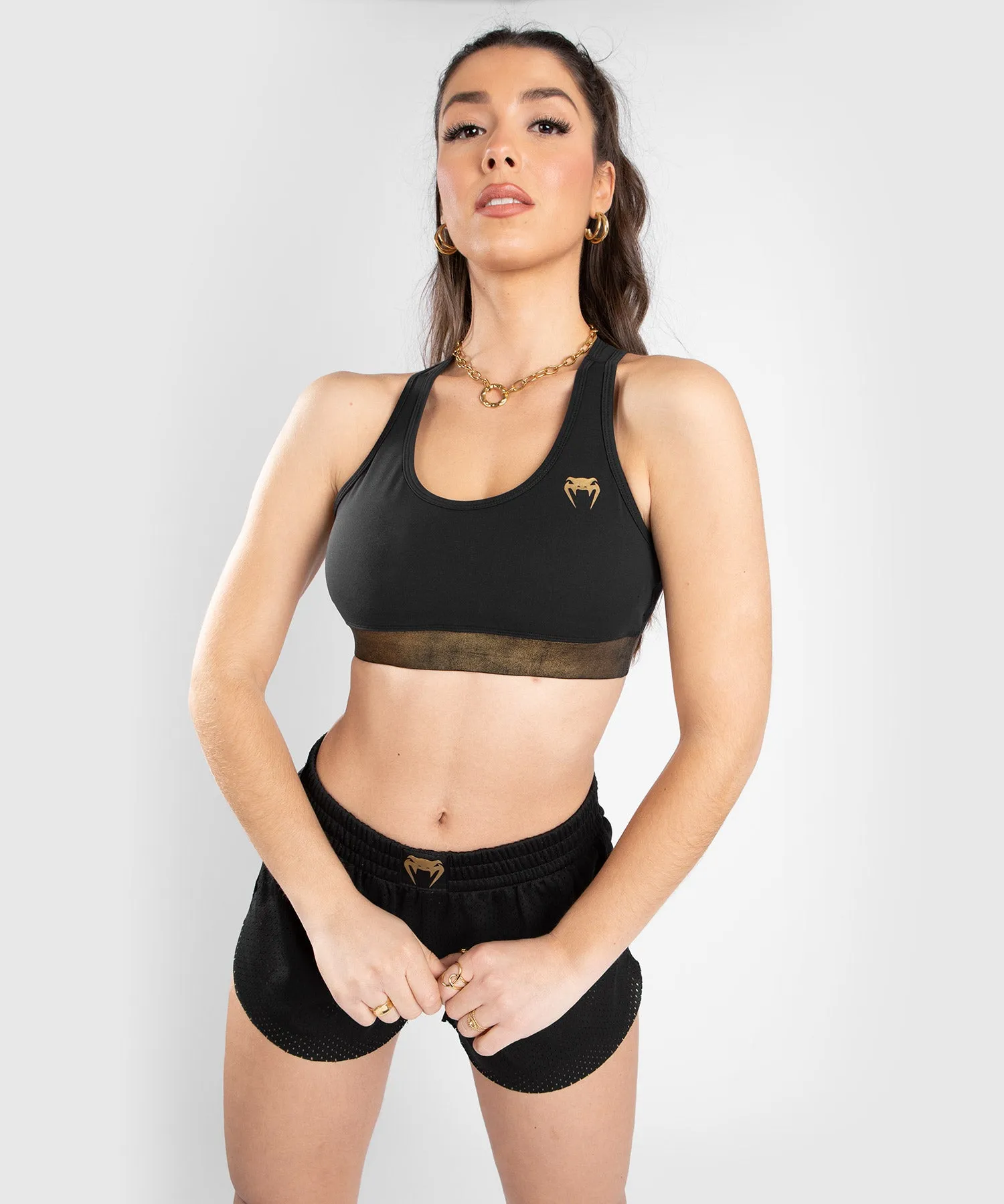 SUJETADOR DEPORTIVO VENUM LIGHTNING  NEGRO/DORADO