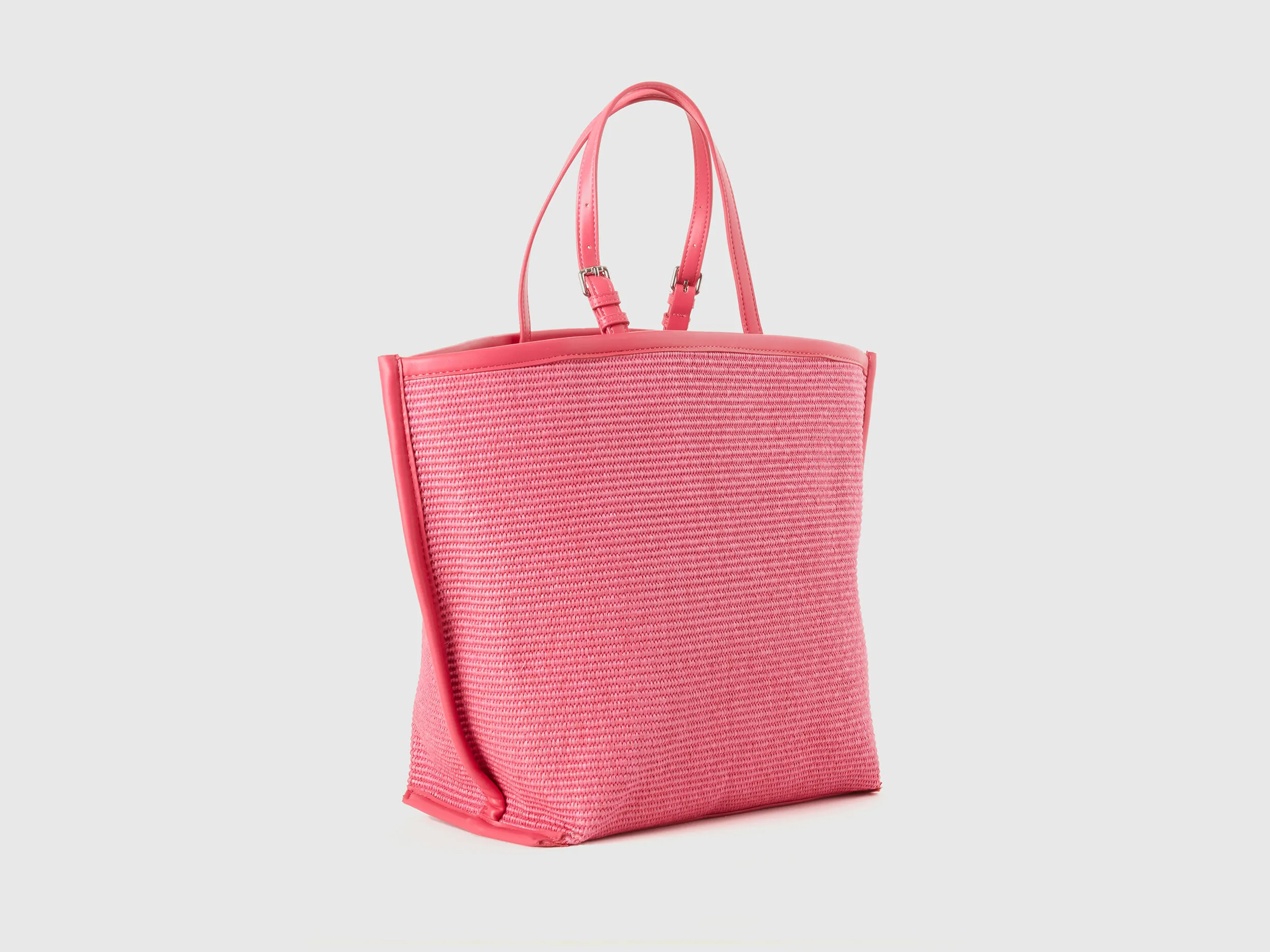Tote bag fucsia con efecto rafia