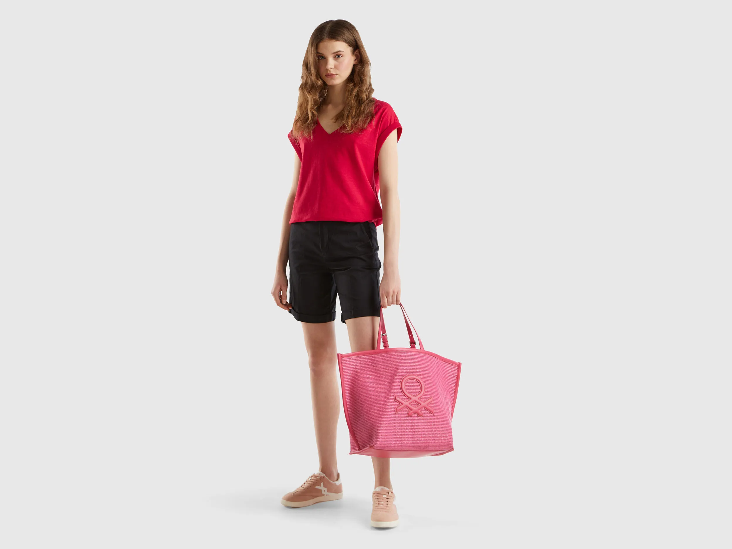 Tote bag fucsia con efecto rafia