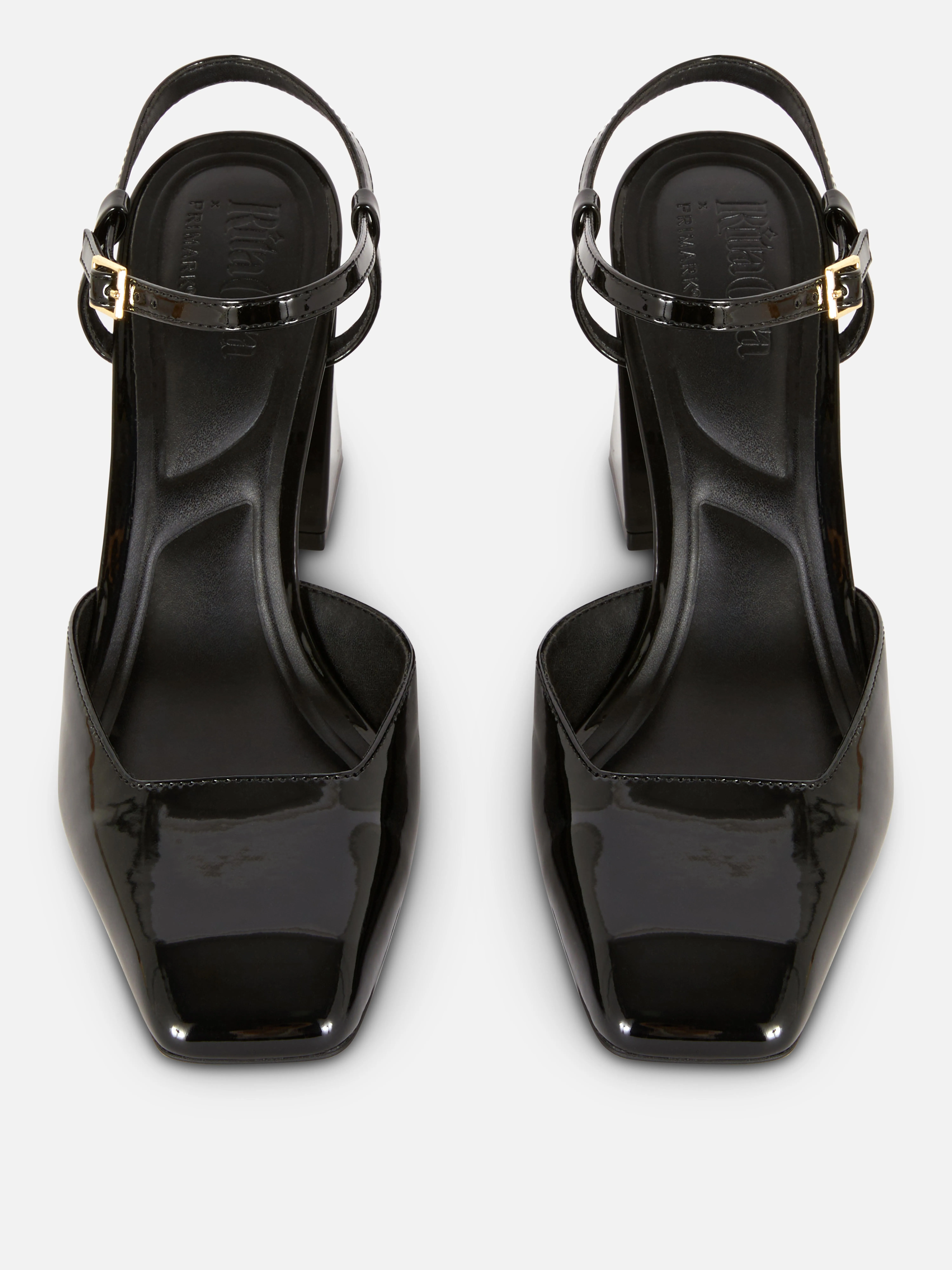 Zapatos de tacón grueso de charol de Rita Ora